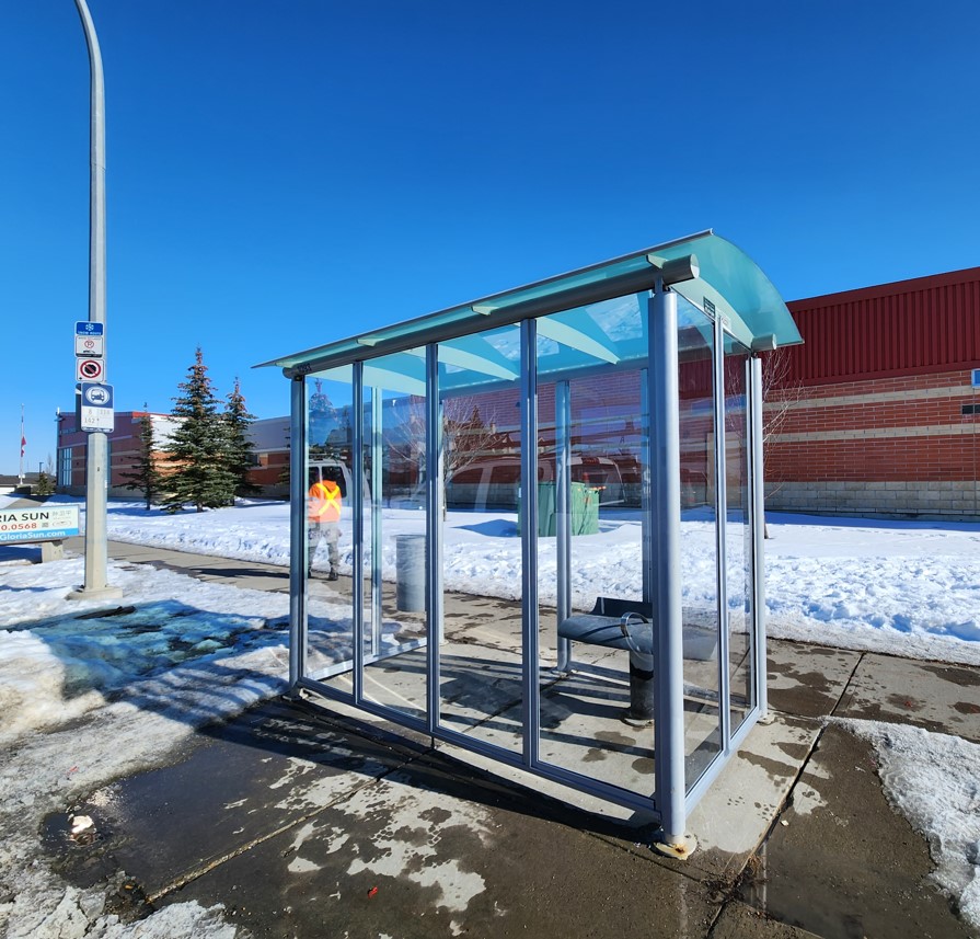 An image of a transit shelter in Calgary that is equipped with an anti-vandalism shelter.